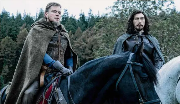  ?? Patrick Redmond / 20th Centuy Studios via Associated Press ?? Matt Damon as Jean de Carrouges, left, and Adam Driver as Jacques Legris in a scene from "The Last Duel."