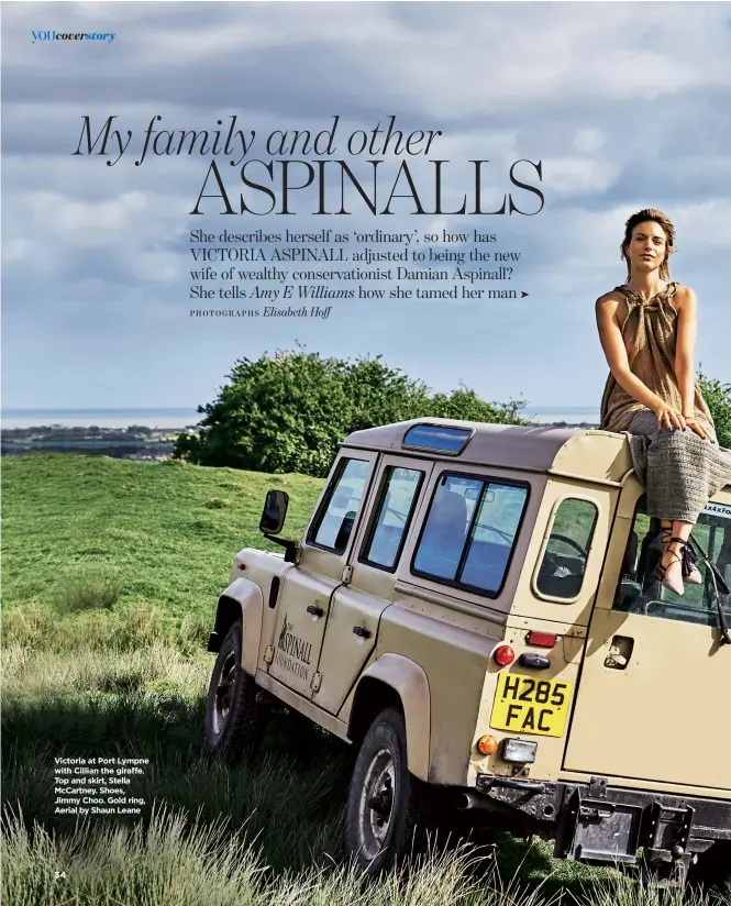  ??  ?? Victoria at Port Lympne with Cillian the giraffe. Top and skirt, Stella McCartney. Shoes, Jimmy Choo. Gold ring, Aerial by Shaun Leane