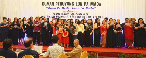  ??  ?? Children, grandchild­ren and great grandchild­ren of Pa Mada singing hymns in a group.