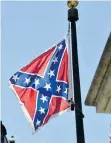  ?? MLADEN ANTONOV/AFP/GETTY IMAGES ?? The Confederat­e flag at the State Congress building in Columbia, S.C. remained at full staff Friday.