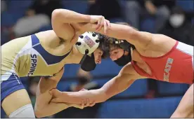 ?? AUSTIN HERTZOG - MEDIANEWS GROUP FILE ?? Spring-Ford’s Dominic Ortlip, left, and Owen J. Roberts’ Sam Gautreau lock up at 120 pounds during a match earlier this season.