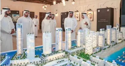  ?? — Wam ?? Sheikh Mohammed bin Rashid and Sheikh Mohamed bin Zayed are being briefed about the joint venture project of Emaar Properties and Aldar. Mohamed Alabbar, Mohamed Khalifa Al Mubarak and other senior officials were also present on the occasion.