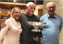  ??  ?? Karlheinz Trophy: Presented by Tanya English and CBYA Chairman Hugh Epsom to Richard Evett