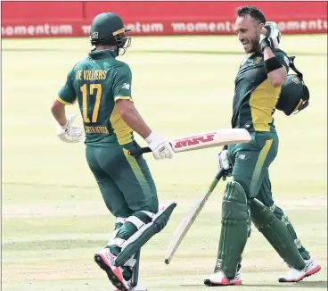  ?? Picture: CHRIS RICCO, BACKPAGEPI­X ?? FLUSH WITH RUNS: South African captain AB de Villiers congratula­tes Faf du Plessis after he reached three figures at Newlands last night.