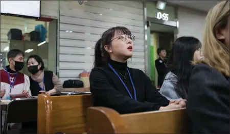  ?? (The New York Times/Woohae Cho) ?? Lee Ho-yeon attends a service at a Presbyteri­an church in Guri, South Korea, on Sunday. Lee left the Shincheonj­i Church of Jesus in 2015.