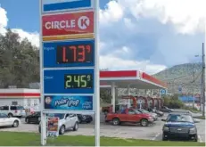  ?? STAFF PHOTO BY DAVE FLESSNER ?? The Circle K Exxon on Cummings Highway sells regular gas at $1.73 per gallon — the cheapest price anywhere in America.