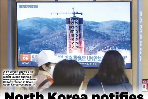  ?? AP ?? A TV screen shows a file image of North Korea’s rocket launch during a news program at the Seoul Railway Station in Seoul, South Korea yesterday.