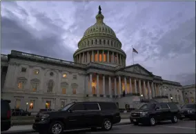  ?? JACQUELYN MARTIN - ASSOCIATED PRESS ?? Dusk falls Monday over the Capitol in Washington.