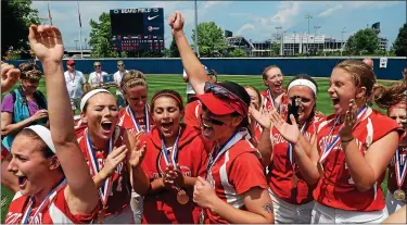  ?? MEDIANEWS GROUP FILE PHOTO ?? The Souderton Area High School Softball team celebrate their 8-3victory over Lower Dauphin for the PIAA 4A State Championsh­ip at Penn State on Friday June 13,2014.