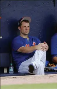  ?? JOHN BAZEMORE - THE ASSOCIATED PRESS ?? FILE - In this March 24, 2017, file photo, New York Mets third baseman David Wright (5) sits on the bench during a spring training baseball game against the Houston Astros, in Port St. Lucie, Fla.