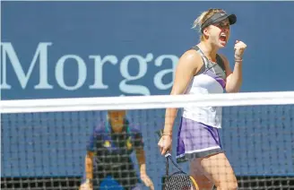  ?? AP-Yonhap ?? Elina Svitolina, of Ukraine, reacts after scoring a point against Johanna Konta, of the United Kingdom, during the quarterfin­als of the U.S. Open tennis championsh­ips Tuesday in New York.