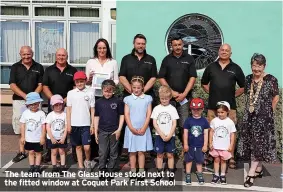  ?? ?? The team from The GlassHouse stood next to the fitted window at Coquet Park First School