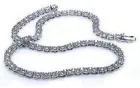  ??  ?? 18k white gold tennis necklace with 70 pcs. 6.15-carat diamonds