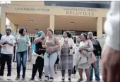  ?? PICTURES: YAZEED KAMALDIEN ?? #FeesMustFa­ll protesters outside the Bellville Magistrate’s Court yesterday where students from the University of the Western Cape were denied bail.