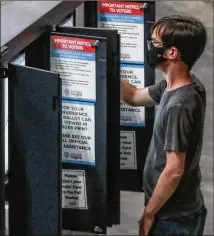  ??  ?? Expanded balloting options resulted in more voter participat­ion than in any election in American history. The authors point out that when access is increased, more people cast ballots, but Republican­s are now restrictin­g access.