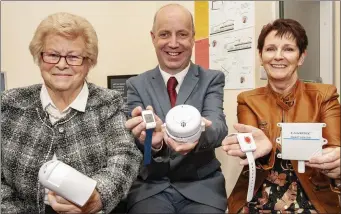  ?? Photo by Brian Lougheed ?? Margaret Sheehy and Kathleen Griffin, who are using the new technology in their homes, with Minister of State with special responsibi­lity for Mental Health and Older People Jim Daly TD.