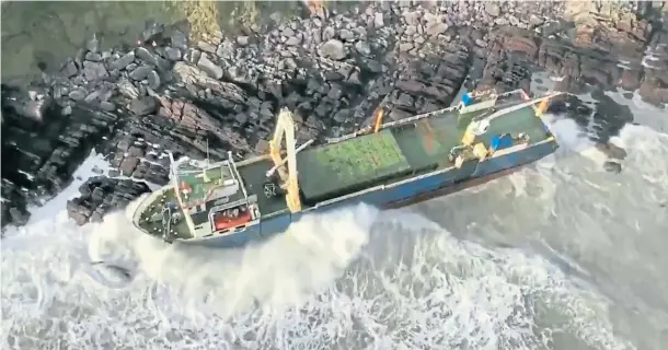  ??  ?? LANDFALL: Drone image of the MV Alta, a cargo ship adrift since 2018 which was washed up on the Co Cork coastline in the Republic of Ireland over the weekend