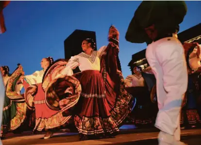  ?? Carlos Avila Gonzalez / The Chronicle 2002 ?? Members of Ballet Folklorico Mexicano de Carlos Moreno perform in the Mexican Independen­ce Celebratio­n at S.F. City Hall in 2002. This year’s event is set for Sept. 16.