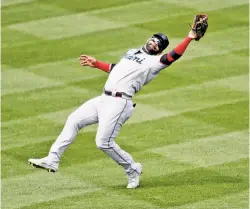  ?? N.Y. Post: Charles Wenzelberg ?? BACK AT CITI: Infielder Jonathan Villar, making an over-the-head catch at Citi Field last season, joins the Mets after splitting 2020 between the Marlins and Blue Jays.