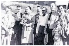  ?? FROM BILL BUCHALTER, “ON THE FIFTY” (1996) ?? The Elks Club Tangerine Bowl Committee greets Tangerine Queen Dorothy Sparkman at Orlando’s Herndon Airport in December 1946.