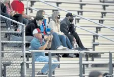  ??  ?? Chaparral supporters spread out in pods in the stands to watch Thursday’s game against Pomona.