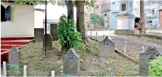  ??  ?? Still intact: The old gravestone­s in the church graveyard. Pic by Athula Devapriya