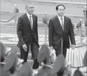  ?? Hoang Dinh Nam AFP/Getty Images ?? PRESIDENT OBAMA and Vietnamese President Tran Dai Quang. Obama was incensed when he learned that Vietnam was intimidati­ng dissidents.