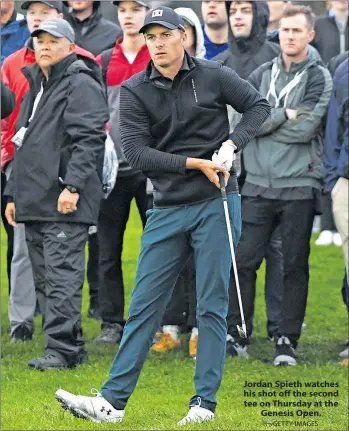  ?? — GETTY IMAGES ?? Jordan Spieth watches his shot off the second tee on Thursday at the Genesis Open.