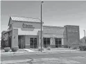  ?? ?? The exterior of Pinal County Federal Credit Union is pictured. Police allege a group of men used an earthmover to steal an ATM from the credit union.