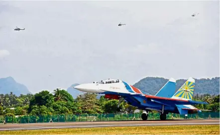  ??  ?? Russian knight: The Russian Air Force’s aerobatic demonstrat­ion team’s Sukhoi Su-30SM fighter jet landing in Langkawi for Lima 2017.