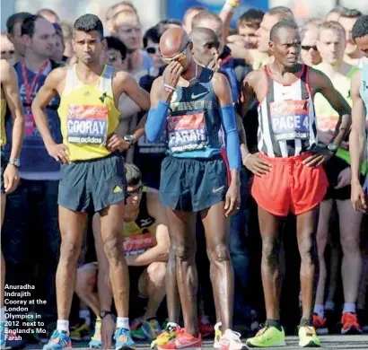  ??  ?? Anuradha Indrajith Cooray at the London Olympics in 2012 next to England's Mo Farah