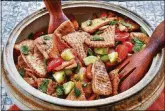  ?? CHRIS HUNT FOR THE ATLANTA JOURNAL- CONSTITUTI­ON ?? You can make Simple Fattoush now, but it is a dish that will get even better when summer tomatoes and cucumbers arrive.