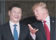  ?? Jim Watson AFP/Getty Images ?? “I HAVE absolute confidence” China will try to put pressure on North Korea, President Trump said after talks with Chinese leader Xi Jinping.
