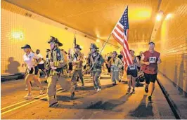  ?? MIKE STOCKER/SOUTH FLORIDA SUN SENTINEL ?? The Stephen Siller Tunnel to Towers Run in Fort Lauderdale is a 5K-walk/run event honoring the courage and dedication of first responders, military men and women and their families.