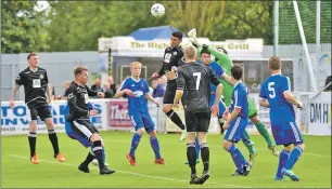  ?? Photo: Brian Battensby Photograph­y. ?? Fort William putting some pressure on the Cove Rangers defence with an in-swinging corner.