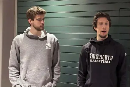  ?? Jimmy Golen/Associated Press ?? Dartmouth basketball players Cade Haskins, left, and Romeo Myrthil were among the athletes who voted, 13-2, on Tuesday in Hanover, N.H., to form a union and be recognized as university employees.