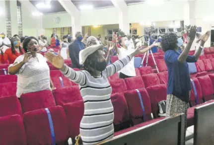  ??  ?? Worship service in progress at the Boulevard Baptist Church in St Andrew, Thursday night. Barbados churches have agreed to suspend face-to-face worship until further notice, because of the novel coronaviru­s pandemic.