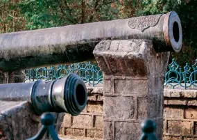  ??  ?? The two medieval cannons in Uparkot Fort were brought from Diu, following a seige in 1538.
From left: Ranakdevi Palace was later converted into a mosque; stone pillars inside the Buddhist caves built during the time of
Emperor Ashoka.