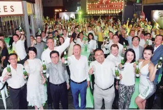  ??  ?? Above: Group photo of Lehmann (front, fourth left) with the Carlsberg Malaysia team and guests at the Carlsberg Smooth Draught pint bottle media and trade partner launch.