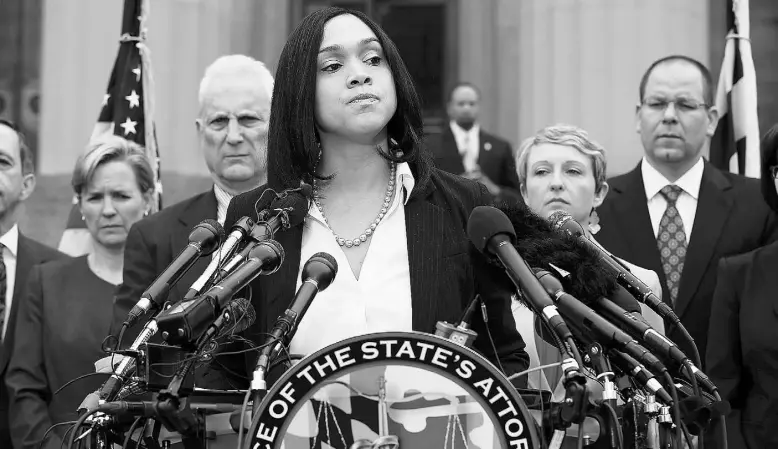  ?? Marilyn Mosby / The Associat ed Press ?? Marilyn Mosby, Baltimore’s top prosecutor, announced criminal charges against six officers who had been suspended after Freddie Gray suffered a fatal spinal injury while in police custody.