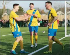  ?? PICTURE: ShutterPre­ss ?? GIVE US A HUG! Jamie Owens, right, leads the celebratio­ns after doubling Stockton’s advantage