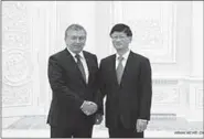  ??  ?? Meng Jianzhu (R), member of the Political Bureau of the Communist Party of China (CPC) Central Committee and head of the Commission for Political and Legal Affairs of the CPC Central Committee, meets with Uzbek President Shavkat Mirziyoyev in Tashkent,...