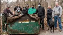  ?? SUBMITTED PHOTO ?? Environmen­tally conscious volunteers who recently helped remove a dumpster from Darby Creek, that was left behind in the aftermath of debris by Tropical Storm Isaias last summer, include Susan Miller, Nicholas Hoyt, Rich Blye, Brian Justin, Joey Mazza, Roy Binion, David Bennett, John Haberle, Rachel Winslow, Jack Pollock, and Rocky the dog.