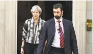  ?? Leon Neal / Getty Images ?? British Prime Minister Theresa May leaves 10 Downing Street to meet with members of her party.