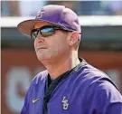  ?? STEVEN BRANSCOMBE/USA TODAY SPORTS ?? LSU's Jay Johnson, shown before a College World Series game last season, is the third-highest paid coach in the SEC.