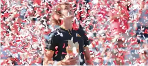  ?? Reuters ?? Zverev is showered with confettis after defeating Federer in the Rogers Cup final. —