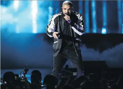  ?? JOHN SALANGSANG/INVISION/THE ASSOCIATED PRESS/FILES ?? Canadian musician Drake was in the spotlight for almost all of 2016.
