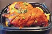  ?? ?? Tandoori chicken served to-go at Naan & Dosa.