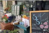  ?? PHOTO COURTESY GENE MCGONAGLE ?? Ambler Flower Shop and Main Street Vintage has a kiosk outside the shop on Butler Avenue in downtown Ambler.