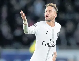  ?? EPA ?? PSG forward Neymar celebrates after scoring against Liverpool at the Parc des Princes in Paris.